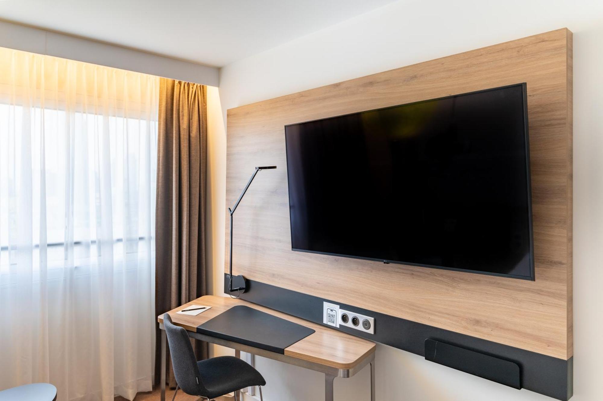 Novotel Warszawa Centrum Esterno foto TV in a room